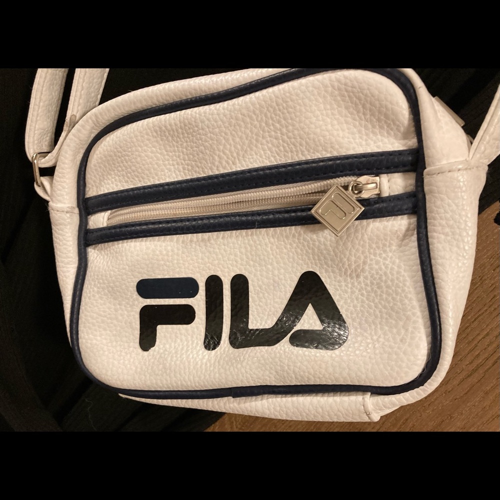 FILA purse. Adjustable strap.